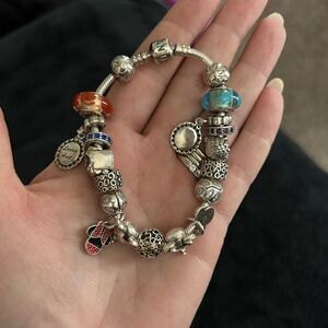 3 pandora bracelets and 22 beads